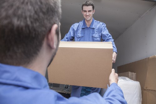Removal team using safe handling practices during a move