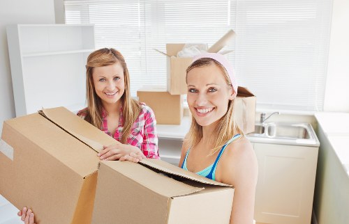 Professional team handling bulky furniture removal in Camden