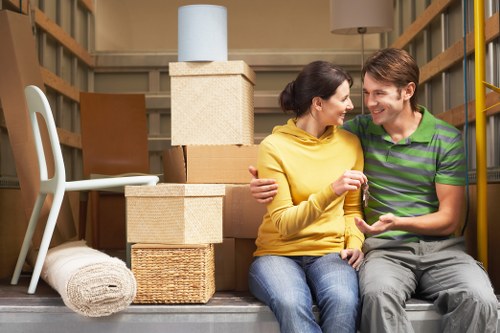 Professional Camden movers loading furniture into a truck