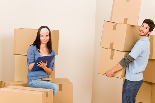 Packed moving boxes ready for removals in Camden property